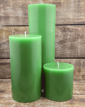 Grouping of three sizes hills of clover pillar candles